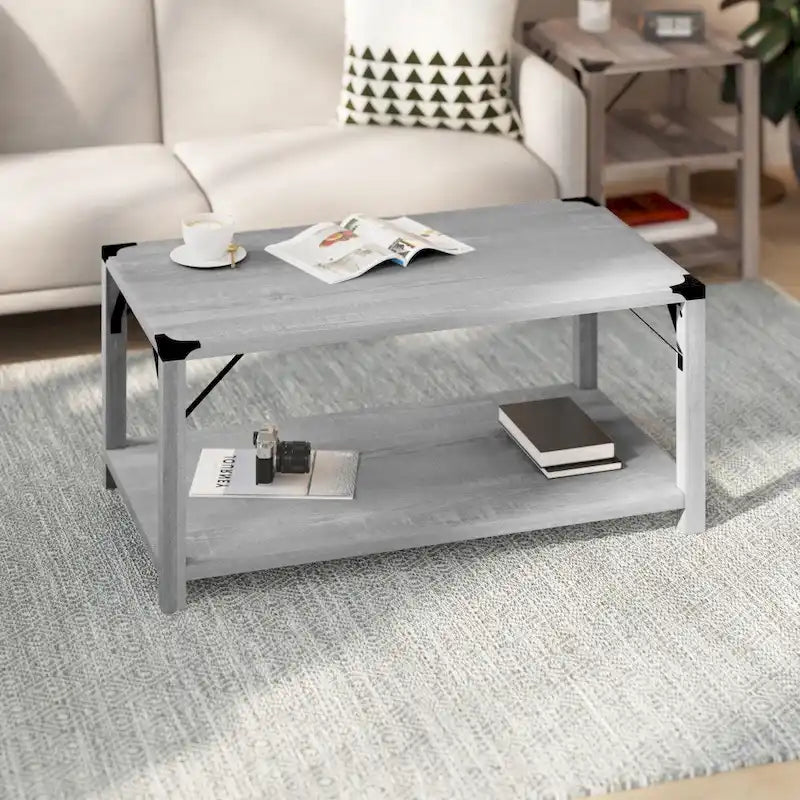 Mesa de centro de 2 niveles con refuerzos laterales de metal y protectores de esquina