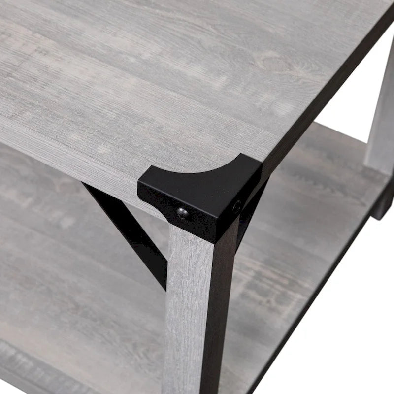 2-stufiger Couchtisch mit seitlichen Metallstreben und Eckkappen