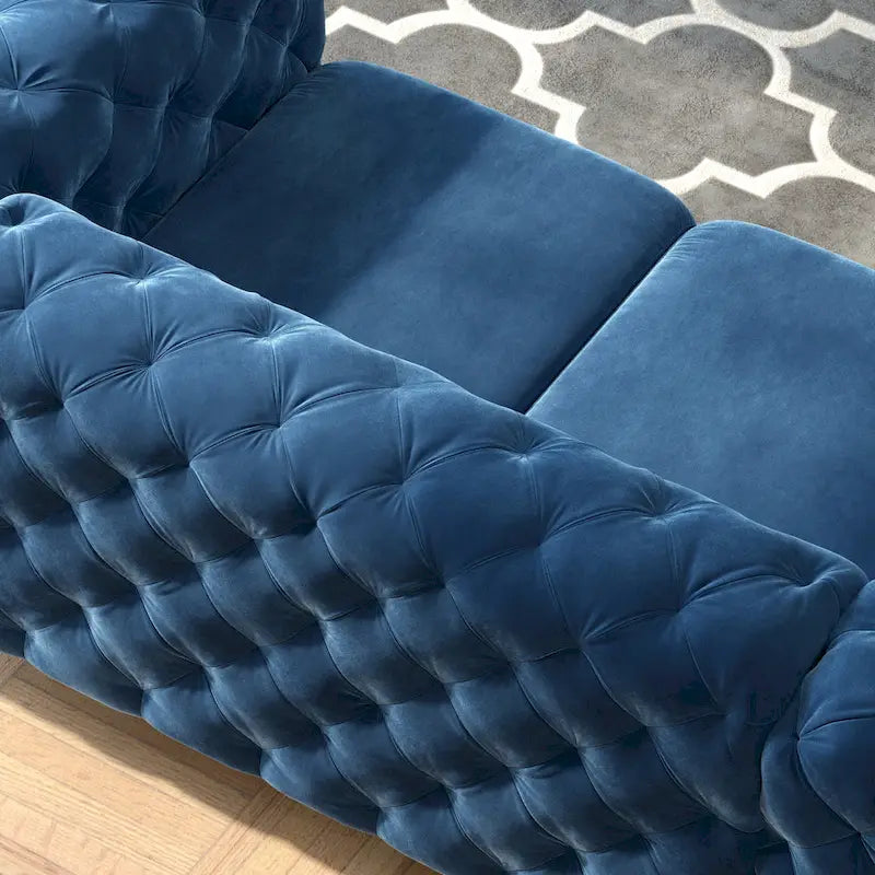 Sofá biplaza Chesterfield de terciopelo capitoné