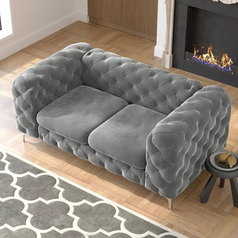 Sofá biplaza Chesterfield de terciopelo capitoné