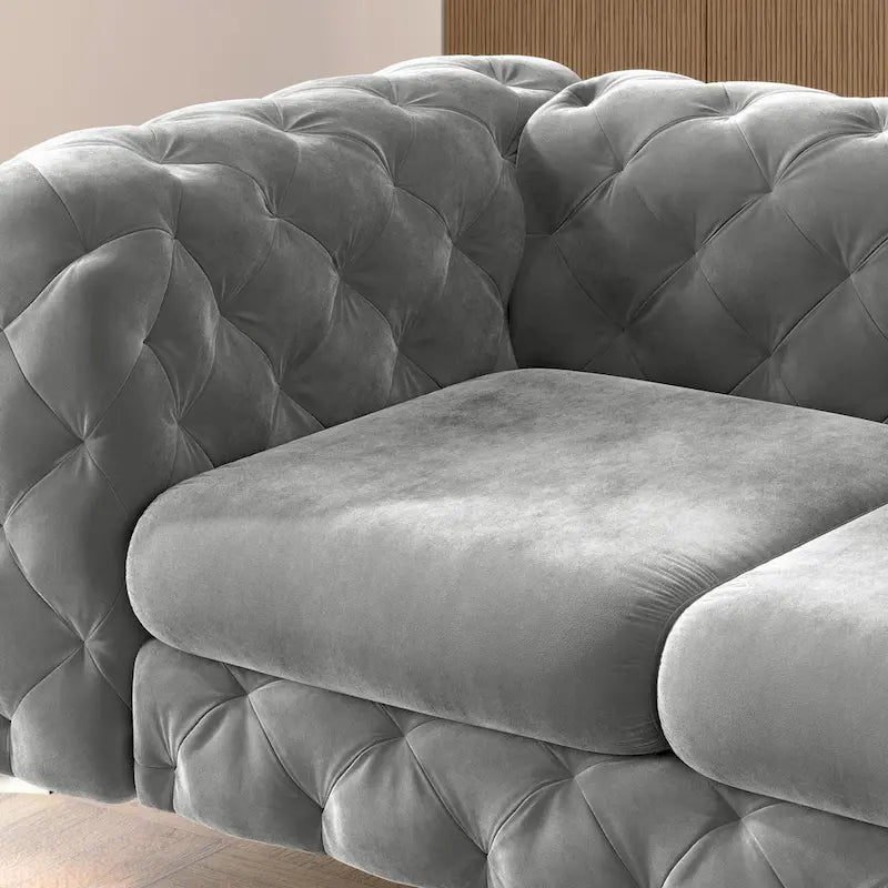 Sofá biplaza Chesterfield de terciopelo capitoné
