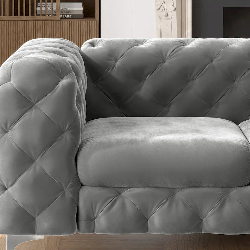Sofá biplaza Chesterfield de terciopelo capitoné