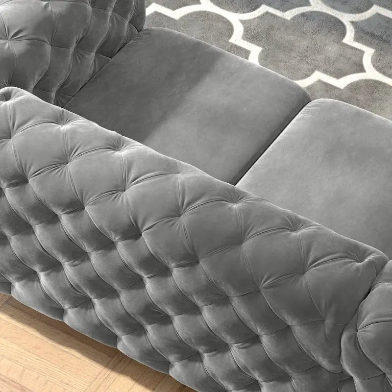 Sofá biplaza Chesterfield de terciopelo capitoné