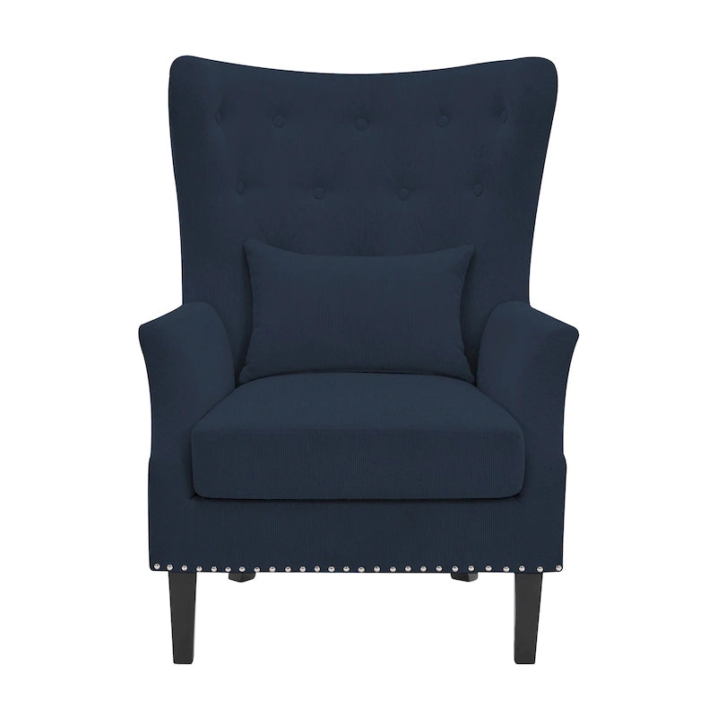 Sillón clásico con respaldo alto, ribete de tachuelas y pana, con cojín lumbar y patas de madera de caucho